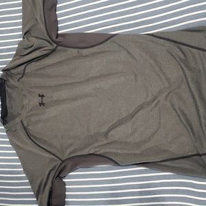 Grey short sleeve Under Armour heat gear compression shirt. Size large